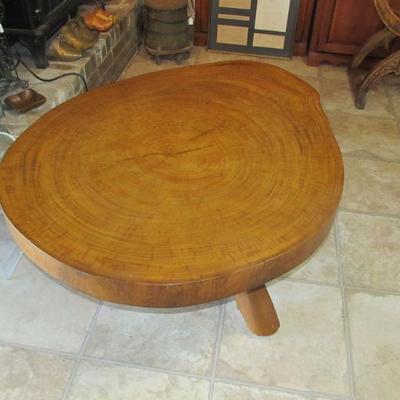 1960s Venezuelan tree stump table made of a fallen old-growth tree. A thing of beauty and an heirloom!  This piece fits any design style...