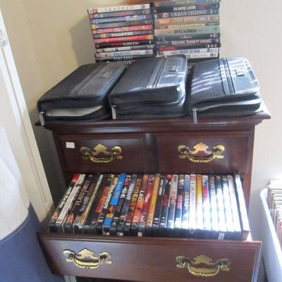 Nice DVD selection, some never opened.  As well as, music CD selection in the black holders.