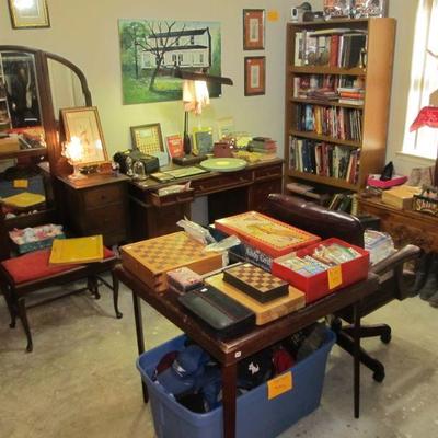 Antique furniture, books, dolls, games, cowboy hats, boots, ball caps