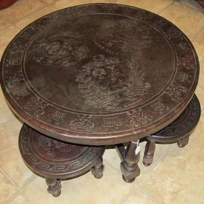 1960s Peruvian leather embossed round table w/ 4 stools. Very Rare and one of a kind. Exquisite and the leather is still beautiful.