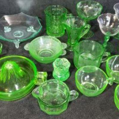 Green Anchor Hocking Collection of 17 pieces. One candle holder, one juicer, three bowls, one toothpick holder, three mugs, four punch...