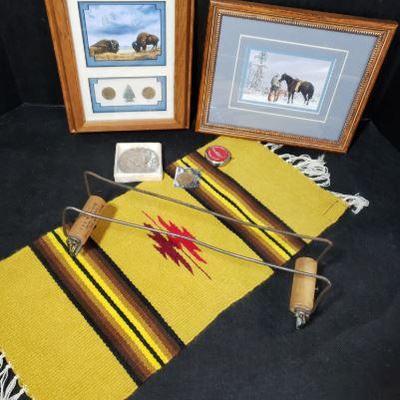 https://ctbids.com/#!/description/share/326863

Native American Indian Loom with two Pictures and Coins. National Cowboy Hall of Fame...