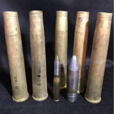1945 mk-4 20 mm shells, also 1944 mk-2 40mm shells. https://ctbids.com/#!/description/share/326921