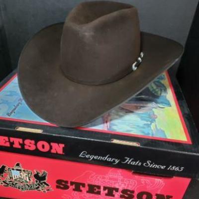 Brown Stetson Hat Size 7 1/8 with Hat Box. Measurements are Length 16 inches, Height 4 inches and Width 13 inches....