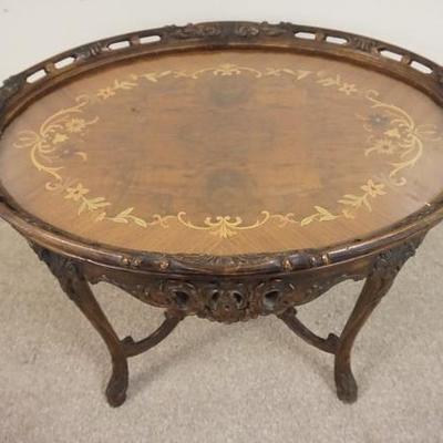 1056	OVAL CARVED & INLAID GLASS TOP TABLE, GLASS TRAY IS REMOVABLE 
