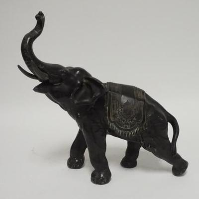 1043	LARGE METAL ELEPHANT HAS SOME PAINT LOSS, 12 1/2 IN L, 13 1/2 IN H 

