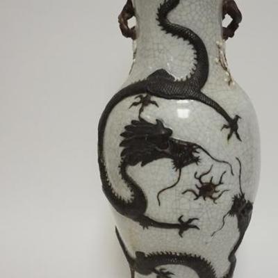 1010	LARGE ASIAN VASE W/ RELIEF DRAGON CHARACTER SIGNED HAS A CRACKLE GLAZE, 24 1/4 IN H 
