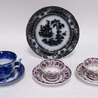 1194	GROUPING OF 19TH C TRANSFERWARE, COREAN FLOW MULLBERRY 9 3/4 IN PLATE, FLOW BLUE CUP & SAUCER & TWO PURPLE TRANSFER HANDLELESS CUPS...