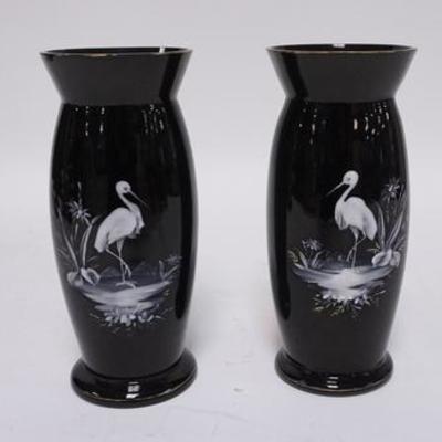 1111	PAIR OF ENAMELED BLACK GLASS VASES HAND PAINTED W/ WADING BIRDS BOTTOM RIMS ARE POLISHED HAND WRITTEN NUMBER 18 ON EACH BASE, 8 IN H 