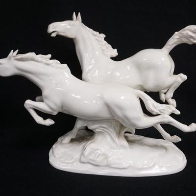 1186	HUTSCHENREUTHER PORCELAIN RUNNING HORSES, 16 IN W, 11 1/2 IN H 
