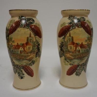 1097	PAIR OF VICTORIAN HAND PAINTED GLASS VASES, HAND PAINTED SCENE OF A VILLAGE W/ A BORDER OF PINE CONES, 12 1/2 IN H 
