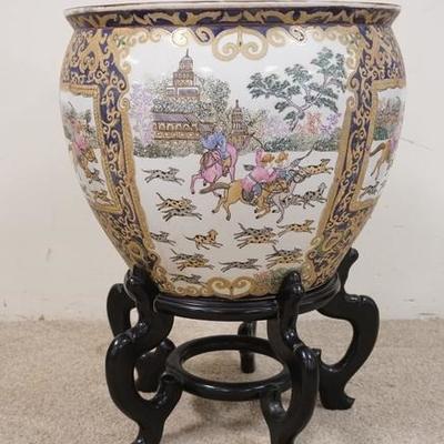 1184	LARGE HAND PAINTED ASIAN JARDINIERE W/ WOODEN BASE, DEPICTS HUNTERS ON HORSEBACK W/ KOI FISH INTERIOR, TOTAL HEIGHT W/ BASE 25 IN,...