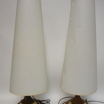 1067	TWO MID CENTURY MODERN BED SIDE LAMPS W/ CONICAL SHADES W/ UNUSUAL TURN WOOD PISTON STYLE SWITCH, SOME WEAR TO SHADES
