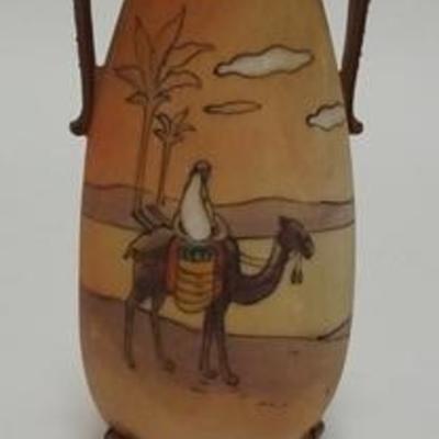 1040	HAND PAINTED NIPPON SMALL FOOTED CABINET VASE W/ AN ARABIAN SCENE GREEN WREATH MARK, 4 3/4 IN H 
