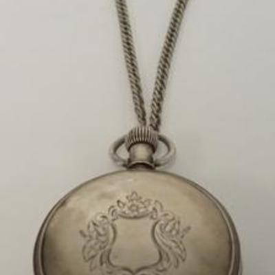 1031	NY STANDARD COIN SILVER POCKET WATCH, THERE IS A HAIRLINE IN THE ENAMELED FACE, 2 1/8 IN D
