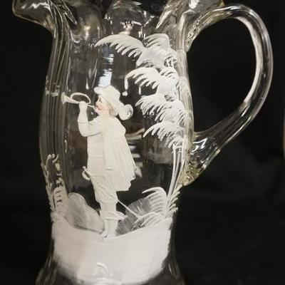 1096	VICTORIAN BLOWN ENAMELED WHITE PITCHER, ENAMELING DEPICTING A MAN PLAYING A BUGLE, ROUGH PONTIL AND APPLIED REEDED HANDLE, 10 IN H 
