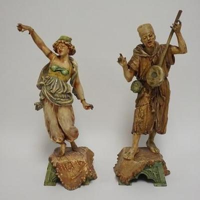 1034	PAIR OF METAL STATUES, MUSICIAN & DANCER, ORIGINAL PAINT HAS SOME WEAR IN SPOTS, TALLEST IS 22 1/4 IN 
