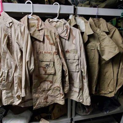 7114: Military Shirts and Camo Jackets
Tan and green camo shirts.
