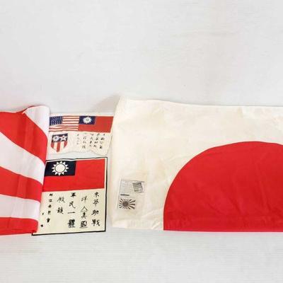 7704:Japanese Flag, "The Rising Sun" Flag and More
This lot contains a flag of Japan and one other japan imperial...