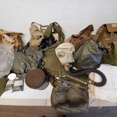 7103: Gas Masks and Bags
World War circa gas masks. Satchels containing gas masks.
