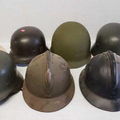 7048: 8 Vintage Military Helmets
8 Vintage Military Helmets