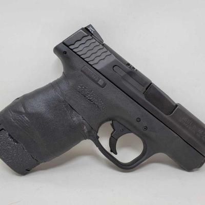 195: Smith & Wesson M&P 9 Shield 9mm Semi-Auto Pistol with Magazine and Box
Includes 8 round magazine and box

Serial Number: HTH4043...