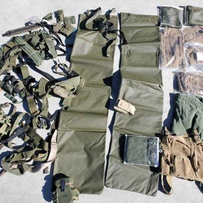 7132: Assorted Military Belts, Straps Clothing and More
Assorted Military Belts, Straps Clothing and More