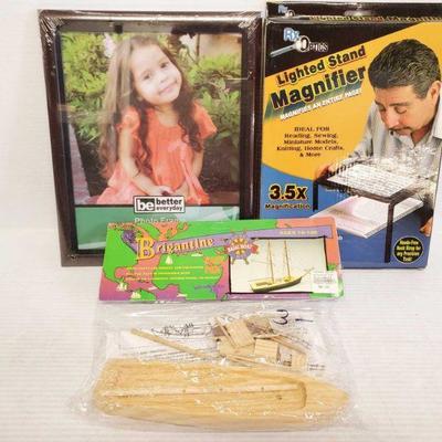 7720: Miscellaneous Items
Contains photo frame, wooden mini sail boat builder and more!