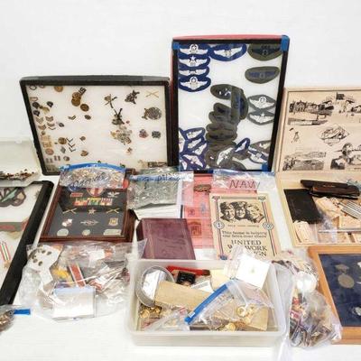 7065: Military Medals In Frames and Pins
This lot contains military items such as many pins from the navy, marines, and more!