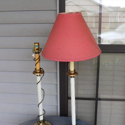pair o lamps, one forlorn without a shade $25 pair