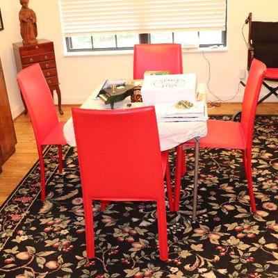 Red plastic chairs with metal frame 1 of 4 34