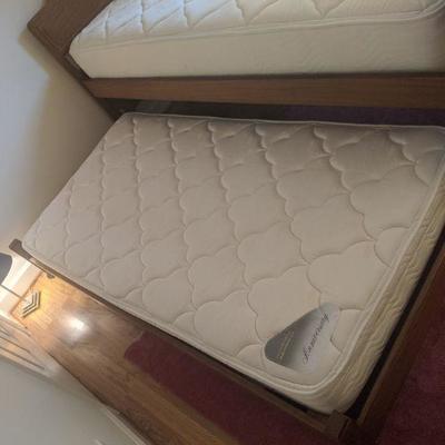 twin bed with trundle, spot on mattress other wise in good condition-- 41.5 in wide, 38.75 inches at tallest point of headboard. $300...