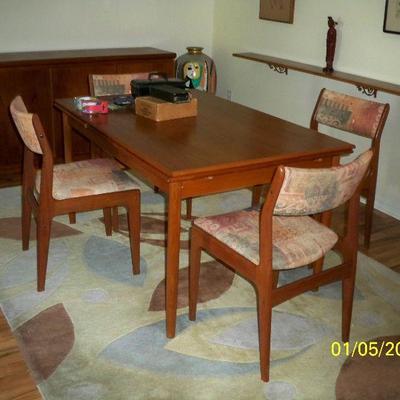 Vintage Danish MCM Expandable Table with 4 Chairs. Table measures closed: 53