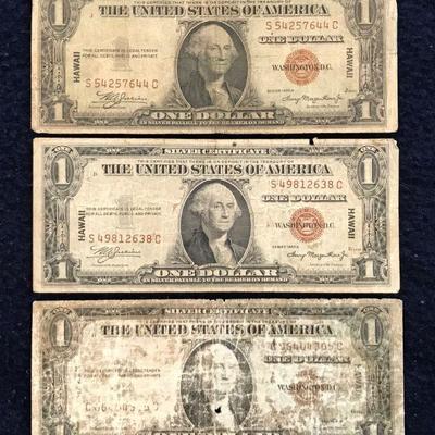 HKT318 A trio of Silver Certificate One Dollar Notes 