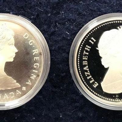 HKT305 A pair of Canadian Silver Dollars