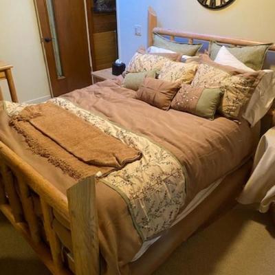 6 piece bedroom set with a brand new mattress with tag in the guest room. 