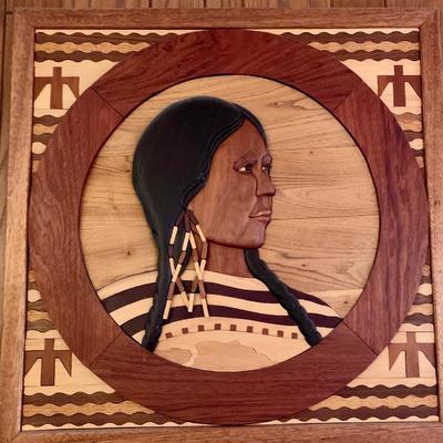 Hand crafted wood plaque of a Native American woman