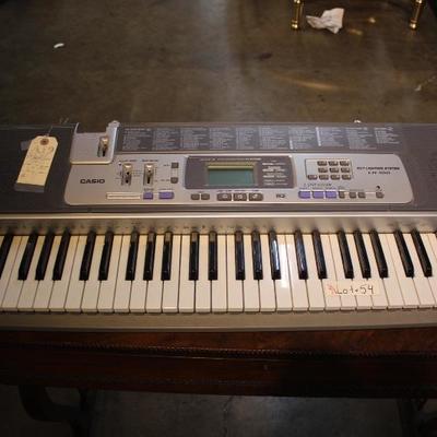 A19 	#7 Casio Electric Keyboard - model lh-100