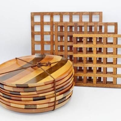 8 wood plates and 3 Wood Trivets