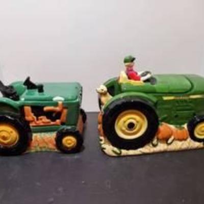 2 John Deere Cookie Jars -one with small chips