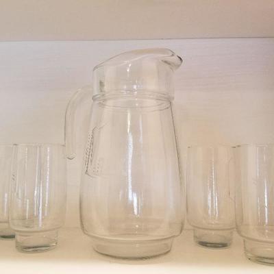 Lot # 53 - $12 Clear glass pitcher and 4 glasses  