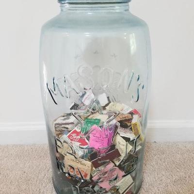 Lot # 107 - $50 Giant Mason Jar with Matchbooks  