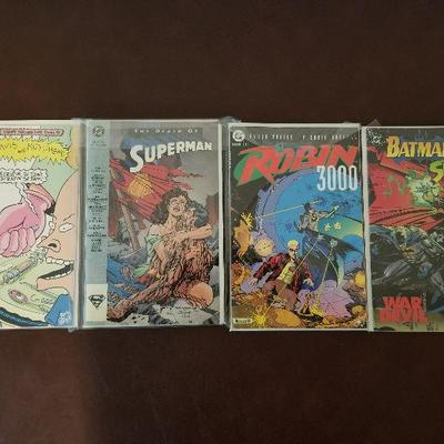 Lot # 190 - $23 FOUR Comic Books - Death of Superman and others 