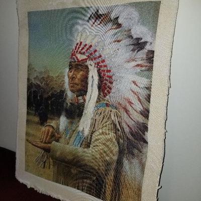 Lot # 194 - $65 Indian Chief Art (Done on Fabric with Pieces of War Bonnet layered on the Fabric) Pic does not do show it clearly. 