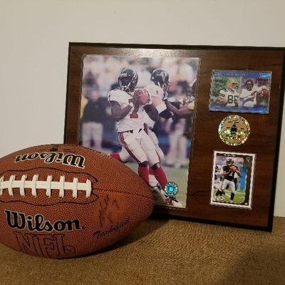 Lot # 160 - $100 Michael Vick Autographed Football & Plaque 