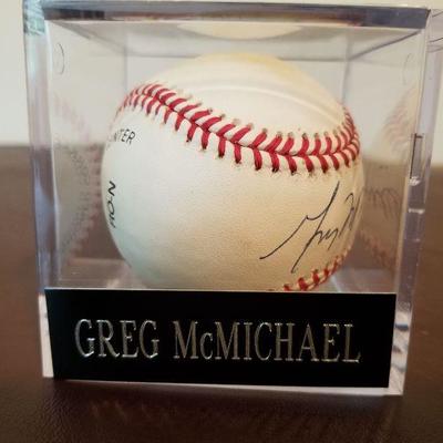 Lot # 212 - $20 Autographed Greg McMichael Baseball  