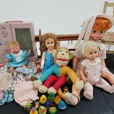 Lot # 105 - $225 for group. Tiny Thumbelina Doll & Clothing PLUS 3 other dolls, Vintage Monkey Doll, 11 Rubber Ducks, Vintage Childs Chair 