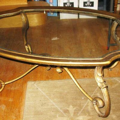 Heavy gold painted iron coffee table with glass top   BUY IT NOW $ 75.00