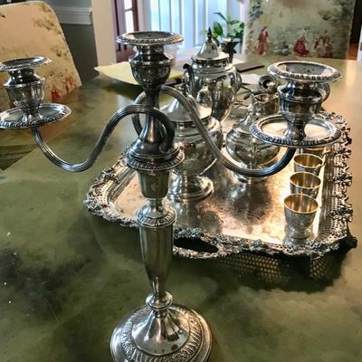 4 piece coffee service sterling $1,178
Tray is separate and is silver plate $150
Candelabra $495
2 available