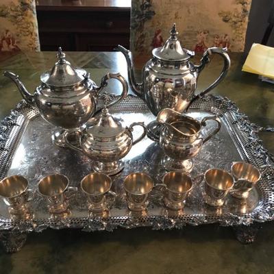 4 piece coffee service sterling $1,178
Tray is separate and is silver plate $150